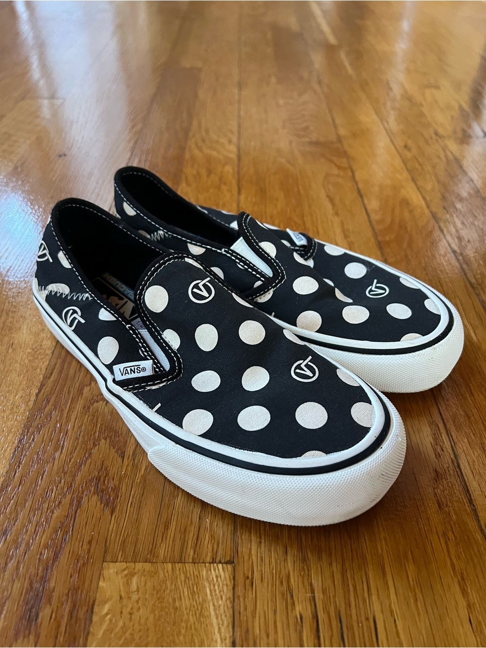 Vans Black and White Polka Dot Slip-On Sneakers